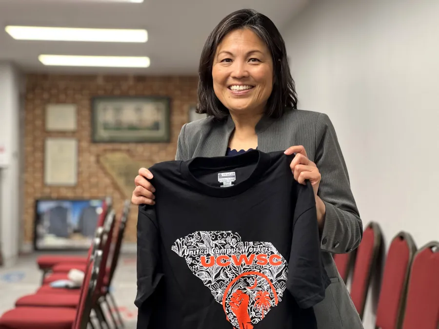 U.S. Secretary of Labor Julie Su with United Campus Workers South Carolina union t-shirt