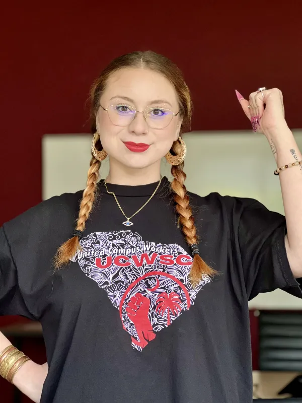 Mariana proudly wears a union t-shirt