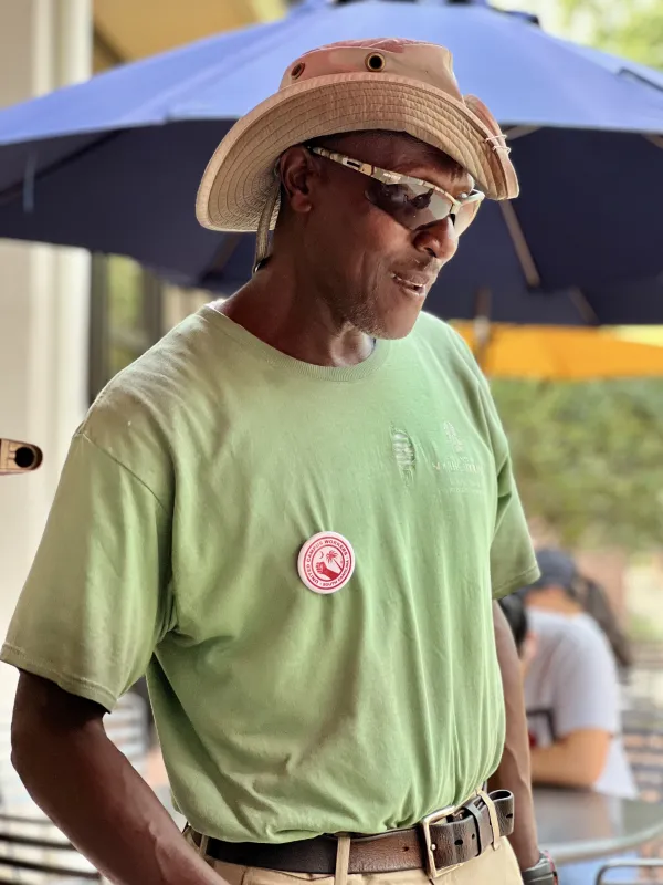 Union member John sports a union button